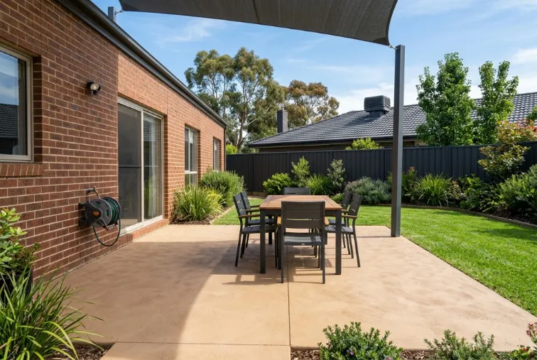 Sandstone, on a patio, coloured concrete in Launceston