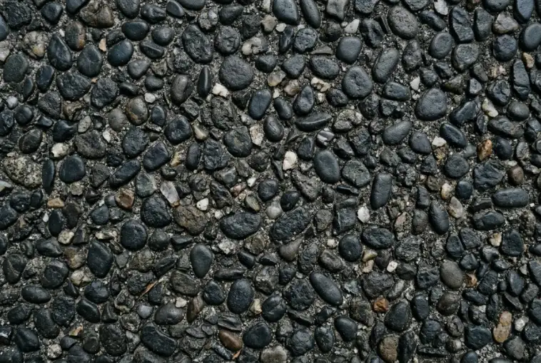 Charcoal and black, exposed aggregate concrete in Launceston