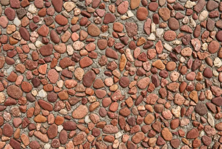 Coral and red, exposed aggregate concrete in Launceston