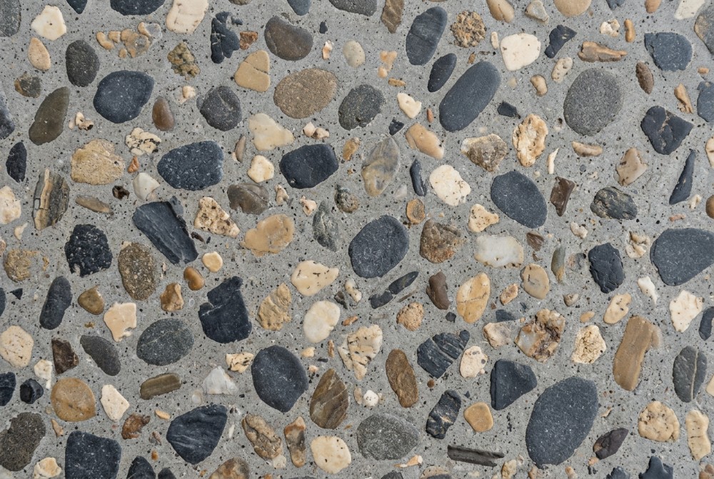 Deep grind, stone showing, honed concrete in Launceston