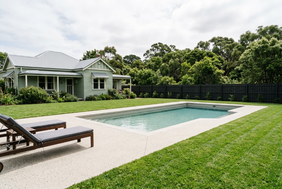 Meeting the Lawn, a concrete pool surround at a Launceston home