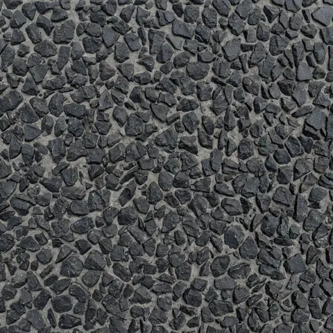 Basalt exposed aggregate concrete, dark and deliberate